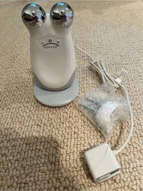 NuFACE Facial Toning Device with charger and extra attachment